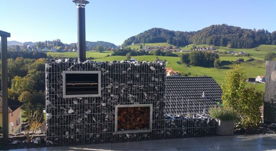 Steinkorb Mit Grilleinsatz Und Holzlager 9502 Braunau
